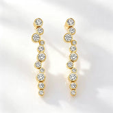 Bulle de Lumière Earrings in gold with exactly 11 round zirconia stones