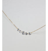 Lumière Rivière Necklace in gold with five graduated round zirconia stones