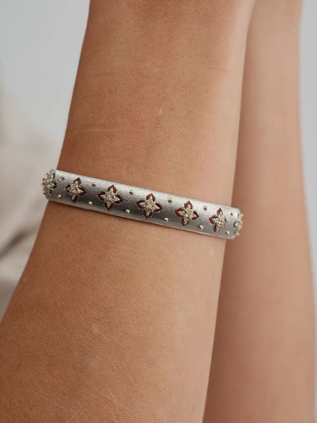 Palais Cuff silver wrist close-up