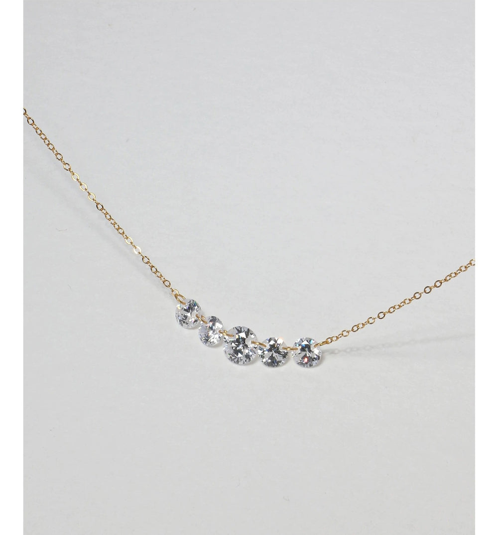 Lumière Rivière Necklace in gold with five graduated round zirconia stones