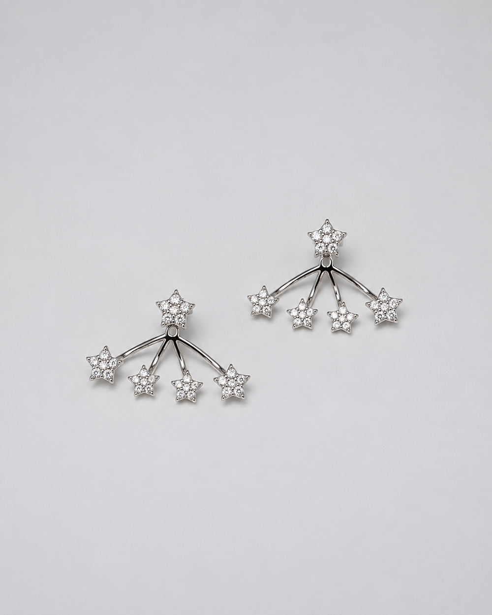 Nuit Étoilée star ear jacket earrings in silver